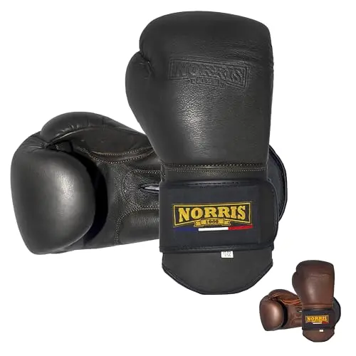 Old school leather boxing gloves with gel padding